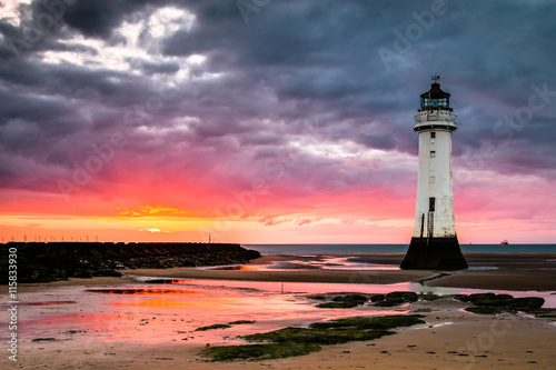 Poster Perch Rock lighthouse at New Brighton near Liverpool at sunset.