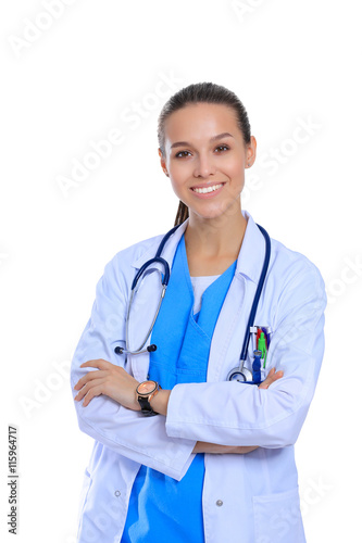 Woman doctor with stethoscope standing with arms crossed isolated on a white bac