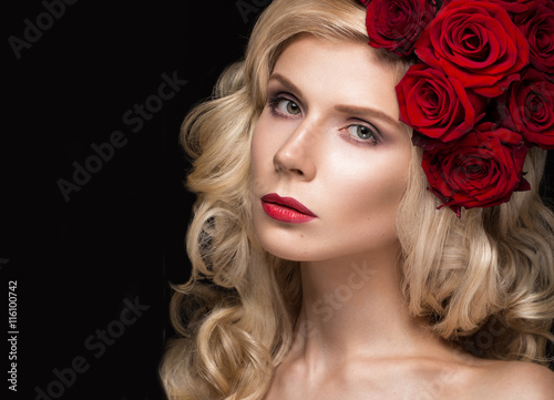 Poster Beautiful blond girl in dress and hat with roses, classic makeup, curls, red lips