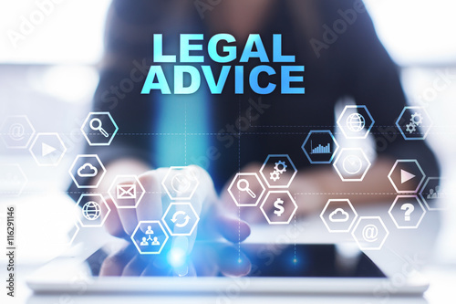 Woman is using tablet pc, pressing on virtual screen and select "Legal advice".