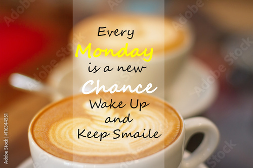 Every Monday is a New Chance wake up and keep smile. Inspirational Quote in blur a cup of coffee on wooden background.