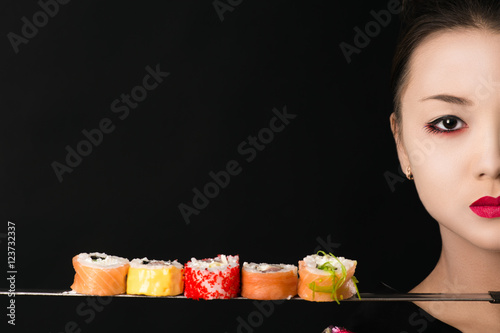 attractive girl with sword and rolls