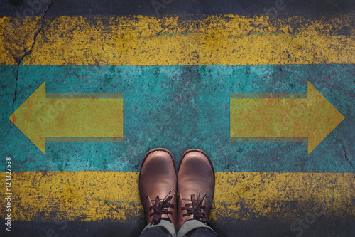 Poster Top view, Male with Leather Shoes, Arrow Sign on Grunge Dirty Concrete Floor Bac
