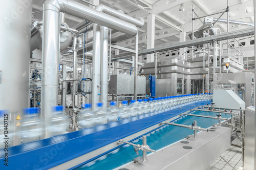 for the production of plastic bottles and bottles on a conveyor belt factory
