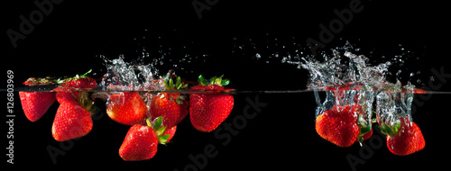  Strawberries splashing into water