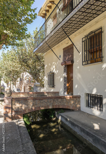 Poster Waterway Typical street of the village and entrance to a house Anna Valencia Spa