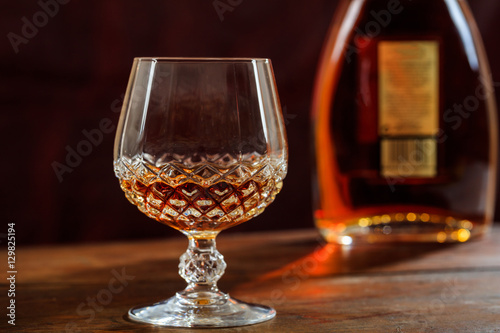 Bottle and crystal glass of cognac