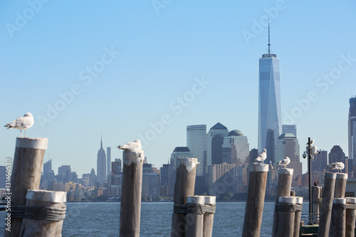 Poster One World Trade Center and New York city skyline view and empty pier