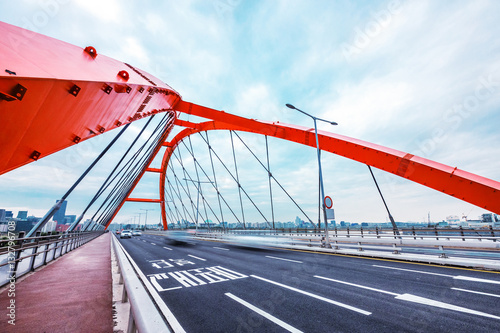 bridge with abstract steel constructions in seoul in cloud sky