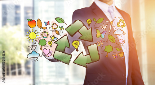 Businessman touching ecology interface with arrow recycling logo