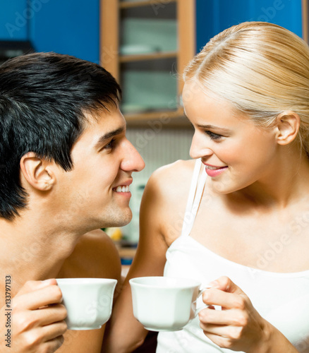 Portrait of young couple at home