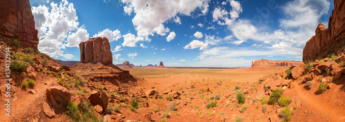 Fototapeta Scenic sandstones, cloudy sky at Monument Valley