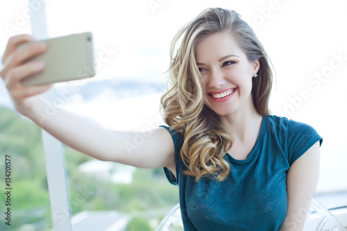 Woman doing selfie phone 