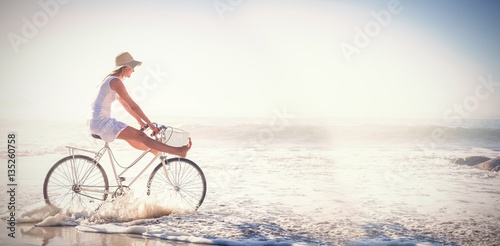 Obraz na płótnie Woman riding bike 