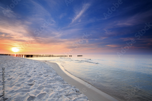 Fototapeta Sunset on the beach on the Baltic Sea