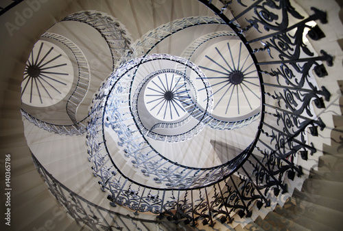 Obraz Fotograficzny Multiple exposure image of spiral stairs, London. Greenwich house