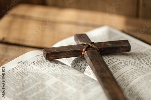 Obraz Fotograficzny Cross on bible.