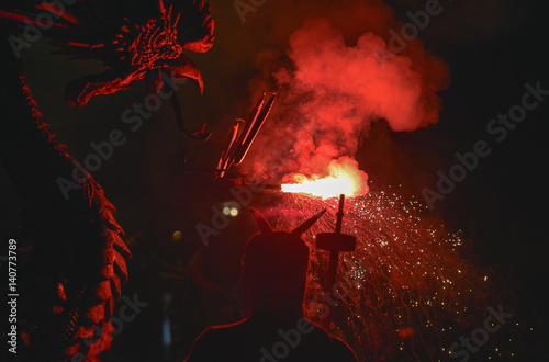 Poster Barcelona: Correfoc, typical catalan celebration in which dragons and devils armed with fireworks dance through the streets