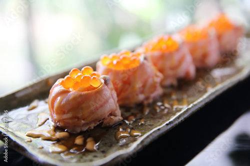 Salmon sushi ball with salmon caviar