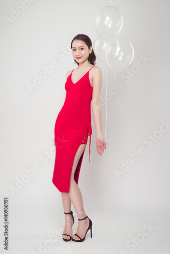 Poster Full-length of fashion photo of beautiful woman with pastel balloons