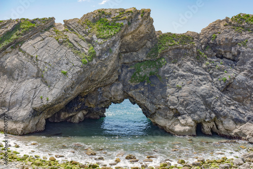 Poster Rock formation at Durdle Door & Lulworth Cove in Dorset, UK on a sunny summer's