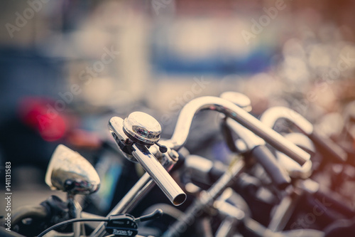 Poster photo of beautiful view on chain of cool bicycles on the parking