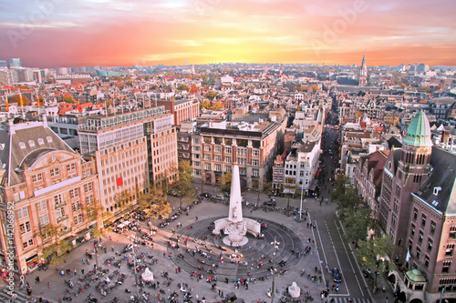 Poster City scenic from Amsterdam with the Dam in the Netherlands at sunset