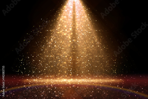 Stage light and golden glitter lights on floor. Abstract gold background for display your product. Spotlight realistic ray