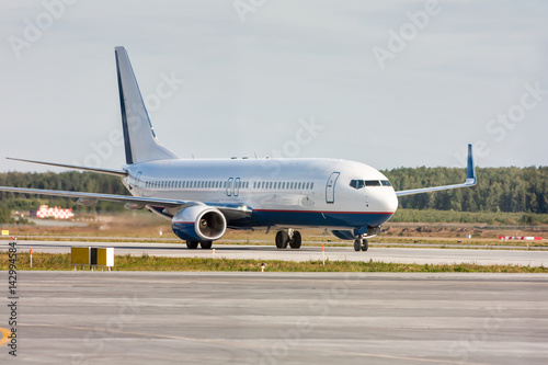 Taxiing aircraft on the main taxiway