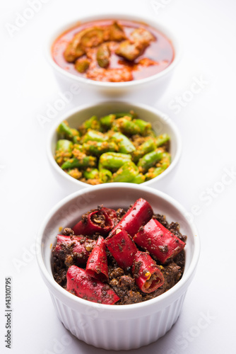 Poster group photo of indian traditional Mango pickle / aam ka achar, hari mirch achar