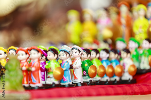 Poster Vietnam's traditional souvenirs are sold in shop at Hanoi's Old Quarter ( Pho Co