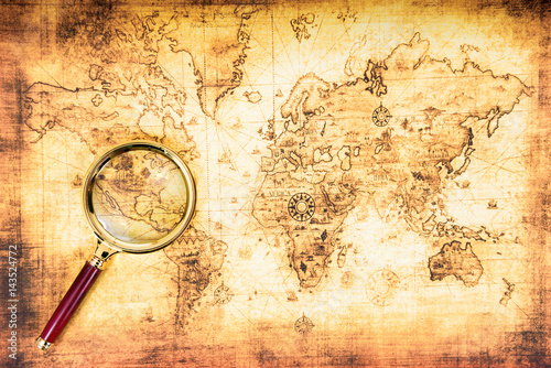 Obraz na płótnie Old map with an magnifying glass