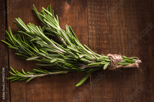 Rosemary on a wooden background
