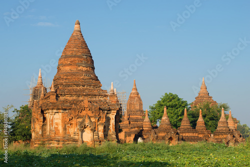 Poster Ancient Buddhist temple complex on a sunny morning. Bagan, Burma