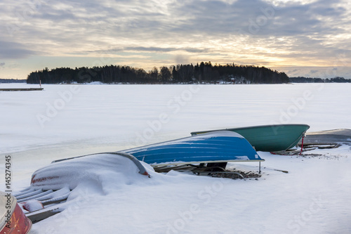 Colorful boats in harbor at winter
