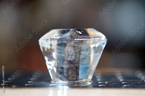curved ice cube at bar