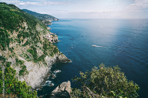 Poster Distant picturesqu view of Vernazza old fishing Village from Cinque Terre path