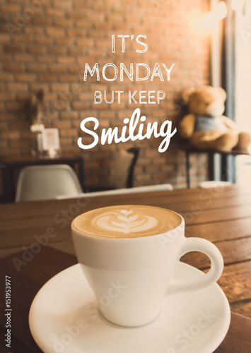 Inspirational quote on coffee cup in coffee shop background with vintage filter