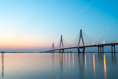 dongting lake bridge in sunset