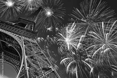 Lacobel Eiffel tower at night with fireworks, french celebration and party, black and white image, Paris France