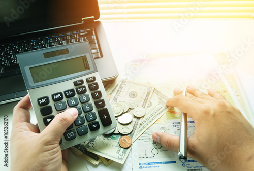 Man Hands Using Calculator To Calculate Saving Travel Trip Man Hands Using Calculator To Calculate Saving Travel Trip