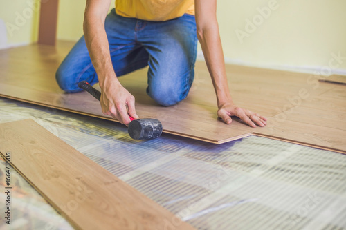 Gamesageddon Man Installing New Wooden Laminate Flooring
