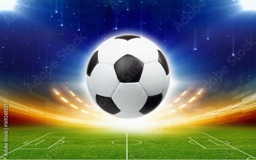 fusball-uber-grunem-fusballstadion-nachts