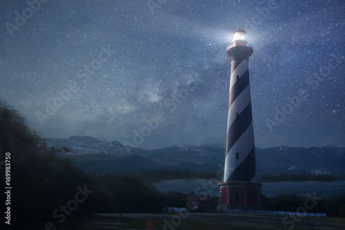 A lighthouse under night sky
