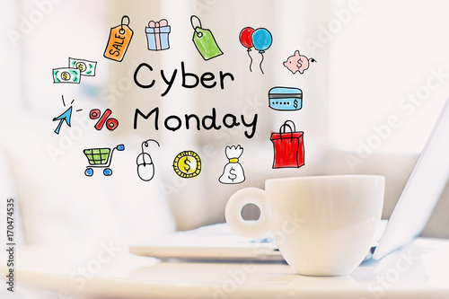 Cyber Monday concept with a cup of coffee and a laptop
