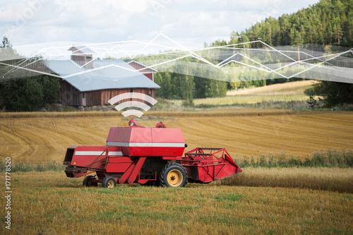 Self driving combine harvester. Internet of things in agriculture © scharfsinn86