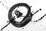 Abstract brush strokes and splashes of paint on white paper background. Watercolor texture for creative wallpaper or design art work, black and white colors.