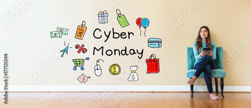 Cyber Monday text with young woman holding a tablet computer in a chair