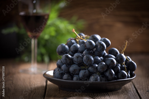 Dark grape in bowl.