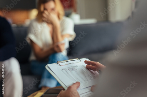 Psychologist consulting couple in trouble